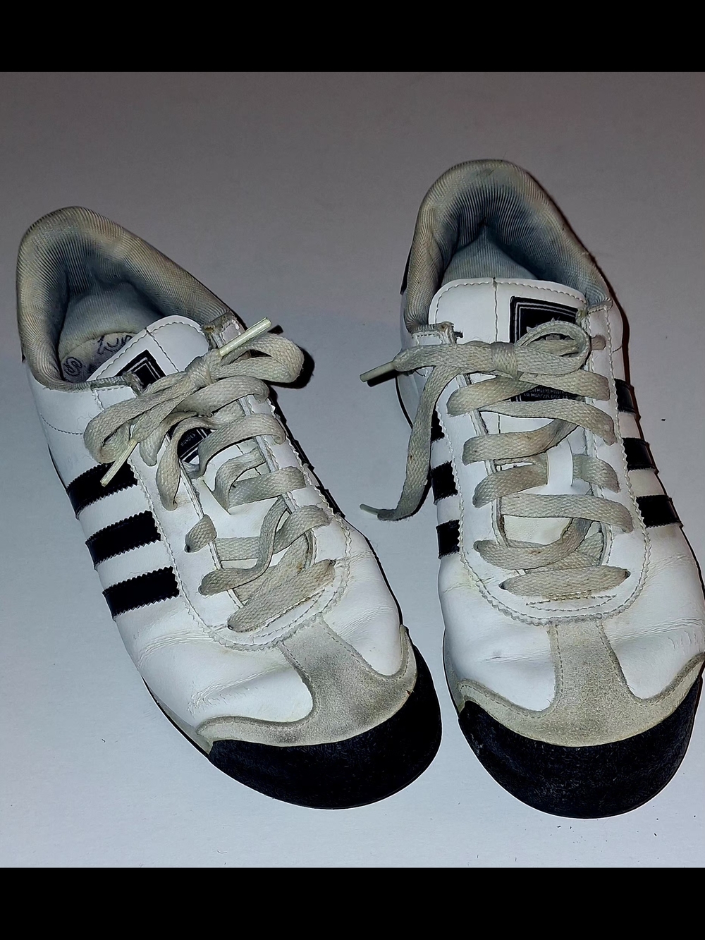 ADIDAS White and Dark Blue Three-Stripe Athletic Sneakers